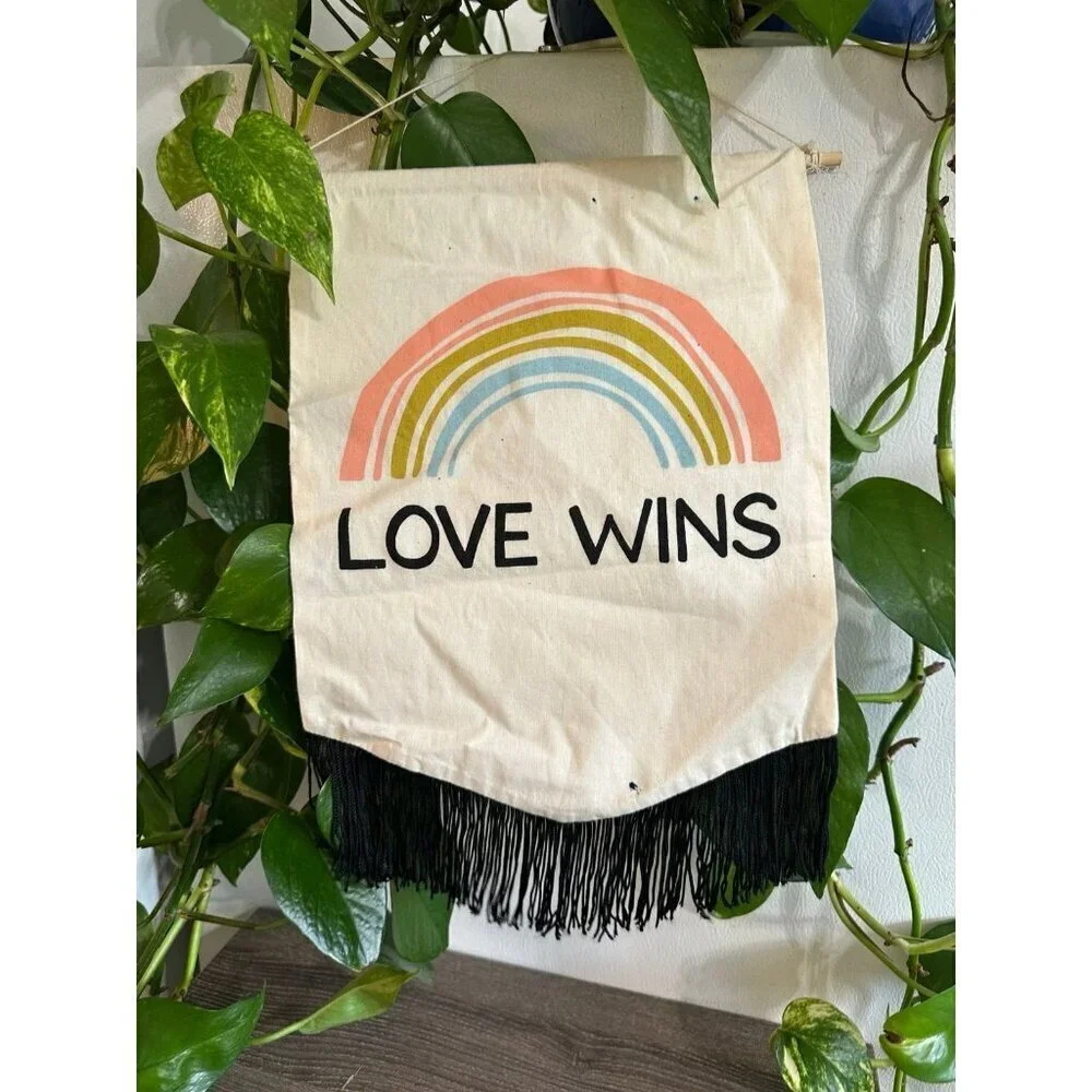 Calhoun & Co. “Love Wins” Wall Hanging